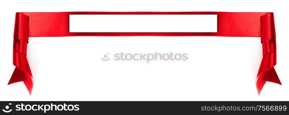 Red satin ribbon banner with white copy space isolated on white background. Satin ribbon banner on white