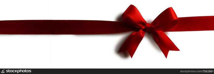 Red satin ribbon bow isolated on white background. Red bow isolated on white