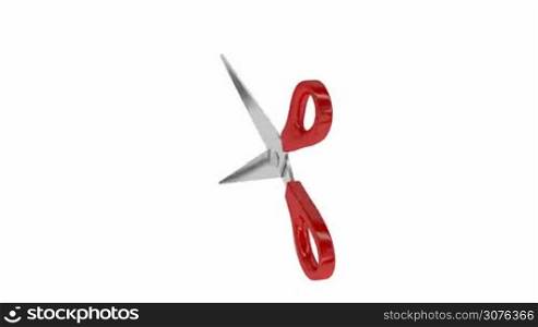 Red scissors, spins on white background