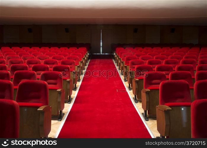 Red seats in a theater and opera