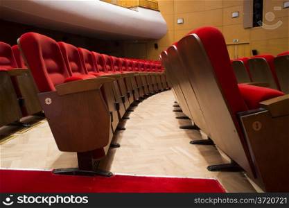 Red seats in a theater and opera