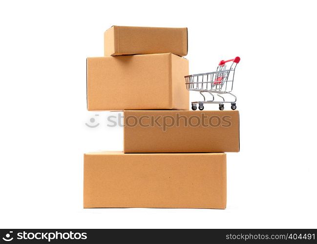 red shopping cart on brown parcels box