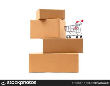 red shopping cart on brown parcels box