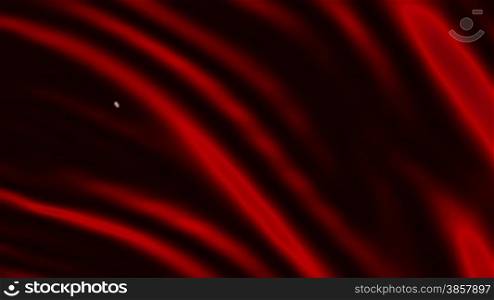 Red silk background with heart being drawn, flowing with the ripples of the fabric.