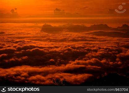Red sky sunrise foggy mist covered forest landscape mountain Dramatic background