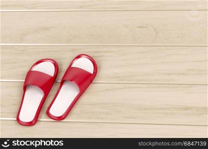Red slippers. Red slippers on wooden floor