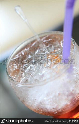 red soda cocktail with ice