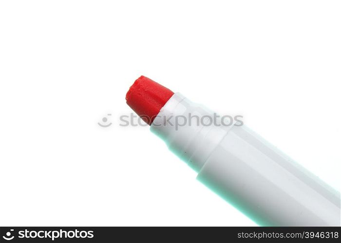 Red soft-tip pen isolated over white background