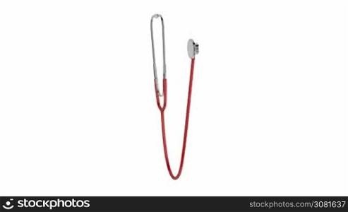 Red stethoscope on white background