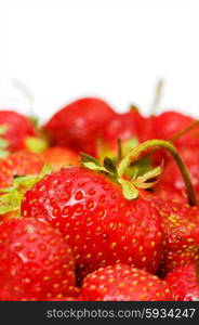 Red strawberries isolated on the white background