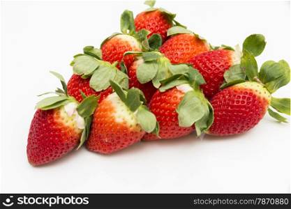 red strawberries on a white background