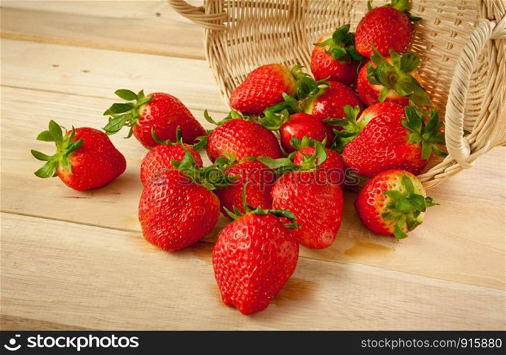 Red strawberries on old wood table
