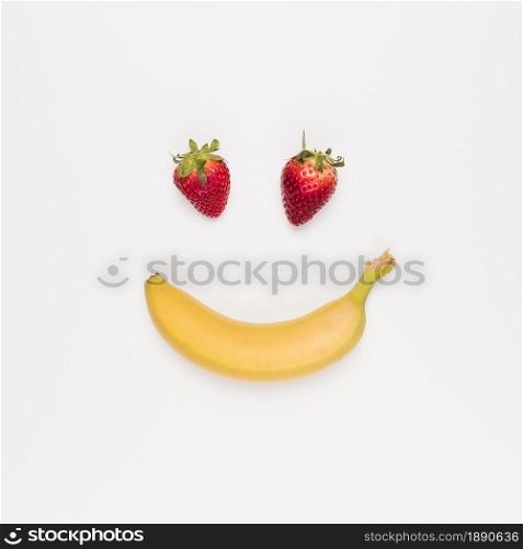 red strawberry yellow banana white background . Resolution and high quality beautiful photo. red strawberry yellow banana white background . High quality and resolution beautiful photo concept