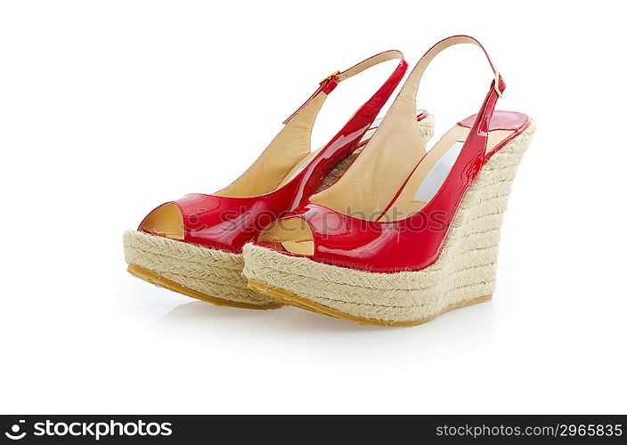 Red stylish woman shoes isolated on the white