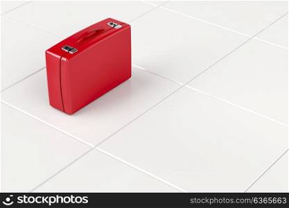 Red suitcase on tile floor