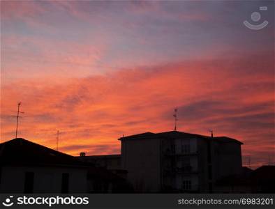 Red sunset over the town, horizontal image