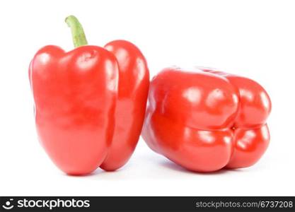 red sweet peppers isolated on white background