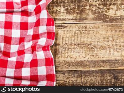 red tablecloth on old wooden table