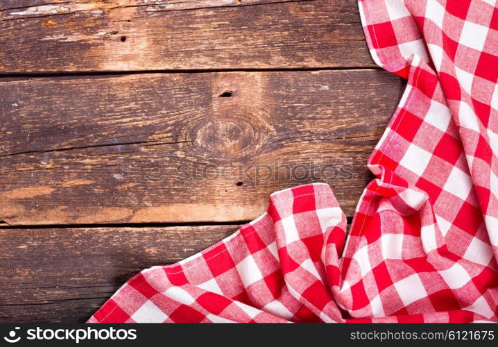 red tablecloth on old wooden table