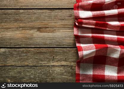 Red tablecloth on rustic background