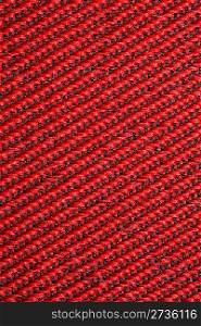 red textural fabric, pattern on diagonal