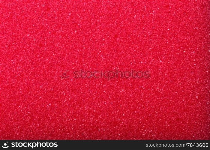 Red texture cellulose foam sponge - background.