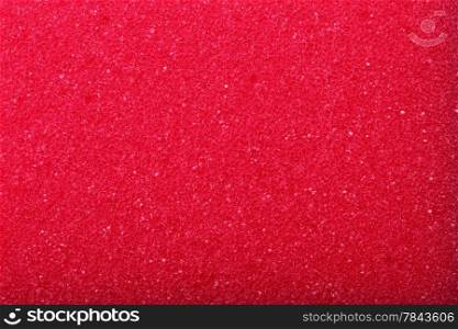 Red texture cellulose foam sponge - background.