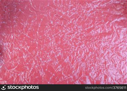 red textured sheet of paper folded in two
