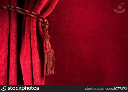 Red theatre curtain and red tassels