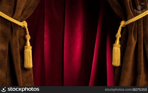 Red theatre curtains and yellow tassels