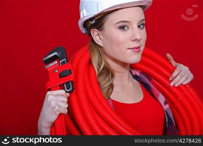 Red themed female plumber