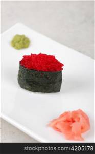 Red tobiko with flying fish roe sushi closeup
