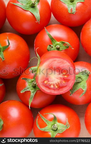 Red tomatoes arranged at the market stand