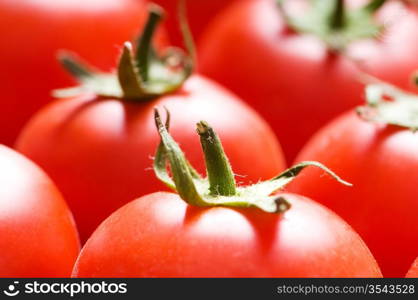 Red tomatoes arranged at the market stand