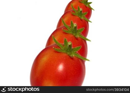 Red Tomatoes. Isoated on the white background