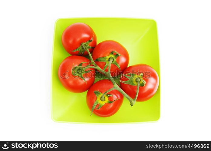 Red tomatoes isolated on the white background