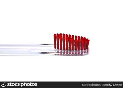 red toothbrush isolated on white background