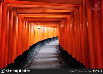 Red Tori Gate at Fushimi Inari Shrine in Kyoto, Japan , selective focus with soft focus