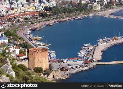 Red tower and port in Alanya, Turkey