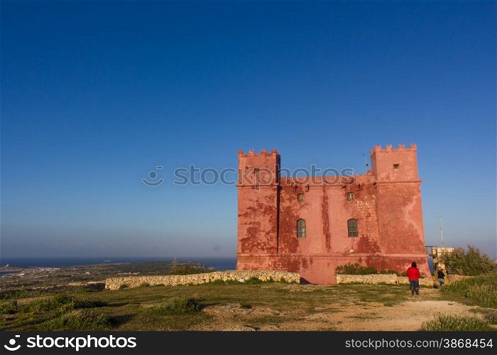 Red tower Malta. typical watchtower military purposes on the coasts of Malta
