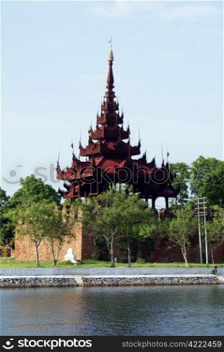 Red tower on the water, Mandalay palace, Myanmar