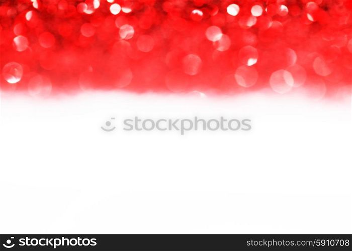 Red twinkling lights abstract holiday background with white copy space