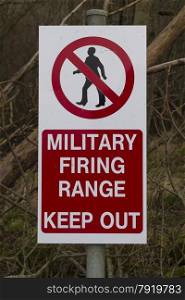 Red UK Army warning sing, crossed through man, Military Firing Range Keep Out.