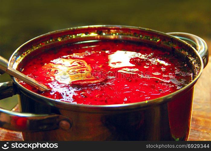 red Ukrainian borsch. plate wth dish of tasty red Ukrainian borsch. Tasty course fresh Ukrainian borsch