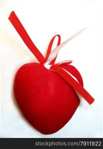 Red valentine heart isolated on the white background