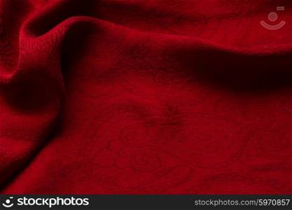 red velvet background. abstract texture of draped red velvet background
