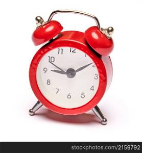 Red vintage alarm clock isolated on white background with clipping path.. Red vintage alarm clock isolated on white background with clipping path