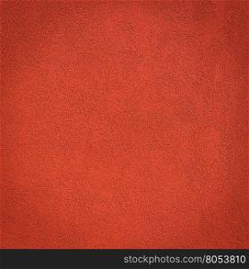 Red wall background and texture with vignetting and blank copyspace for text or advertising.