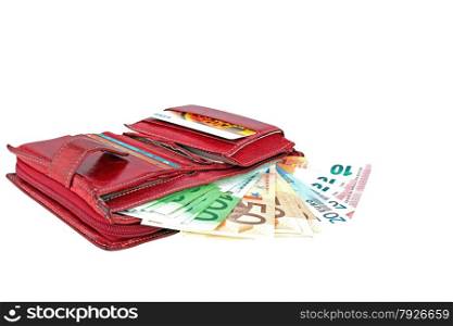 Red wallet full with euro banknotes on a white background.