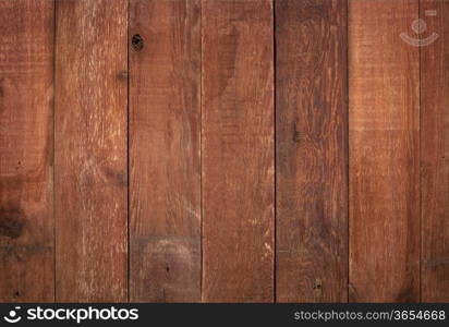 red weathered barn wood background with knots and nail holes